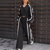 Conjunto de dos piezas de punto en rayas y pantalones anchos