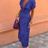 Aria™ - Elegante vestido de escote en V profundo con patrón de hojas