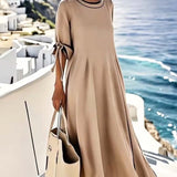 Vestido suelto de mujer con nudo y rayas