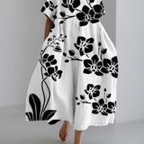 Cassidy - Vestido Floral Negro Fluido y Atemporal