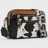 Olivia - Bolso bandolera con correa estampada