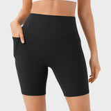 Pantalones cortos deportivos moldeadores de 7" – Con control abdominal, efecto lifting y bolsillos prácticos