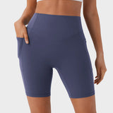 Pantalones cortos deportivos moldeadores de 7" – Con control abdominal, efecto lifting y bolsillos prácticos