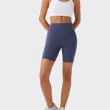 Pantalones cortos deportivos moldeadores de 7" – Con control abdominal, efecto lifting y bolsillos prácticos