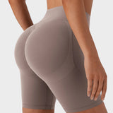 Pantalones cortos deportivos moldeadores de 7" – Con control abdominal, efecto lifting y bolsillos prácticos