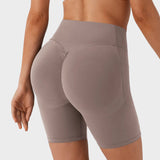 Pantalones cortos deportivos moldeadores de 7" – Con control abdominal, efecto lifting y bolsillos prácticos